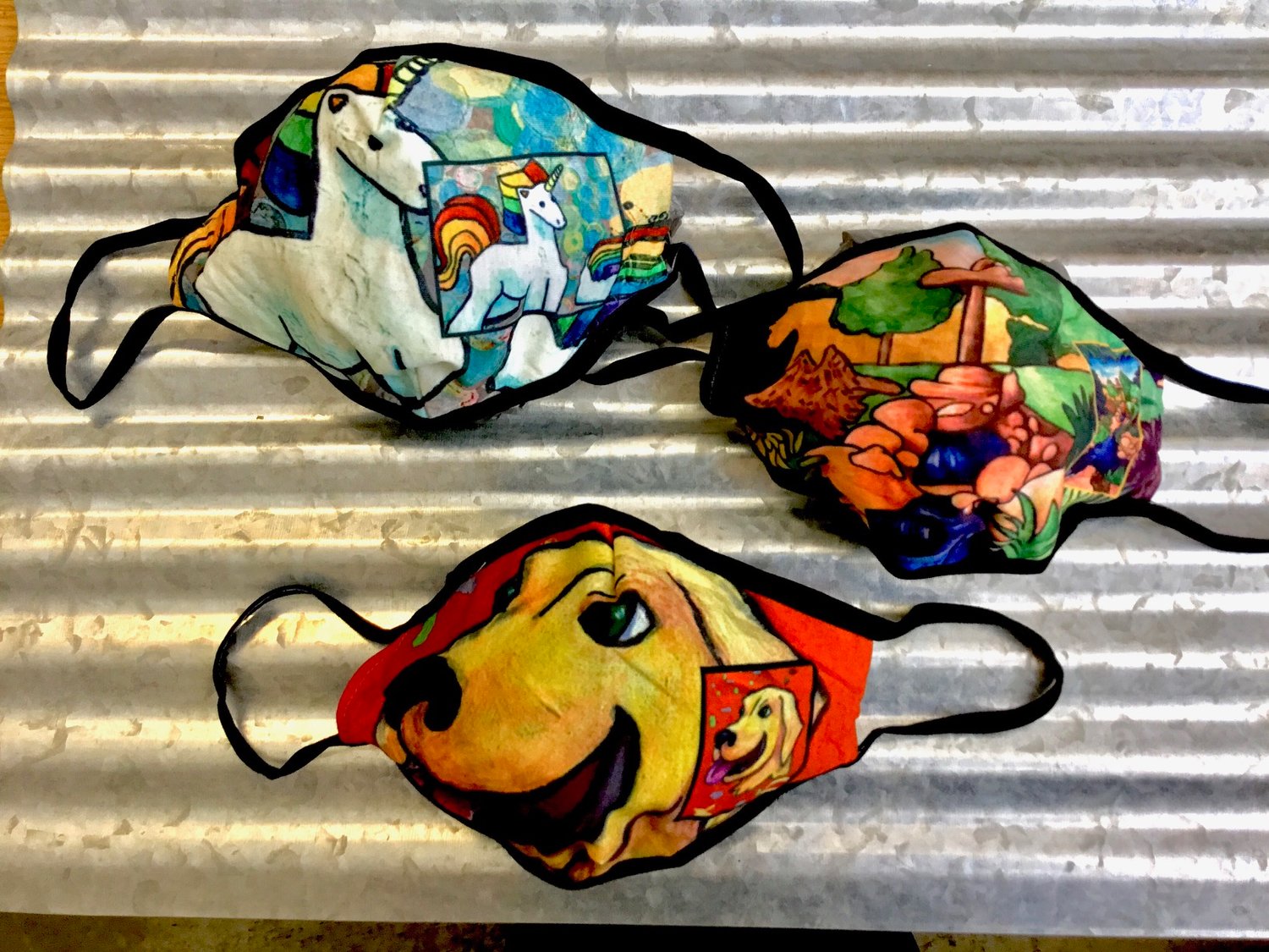 These colorful, unique face masks designed by ASI Inc. clients are on sale at Tri-County Bank & Trust locations in Crawfordsville.